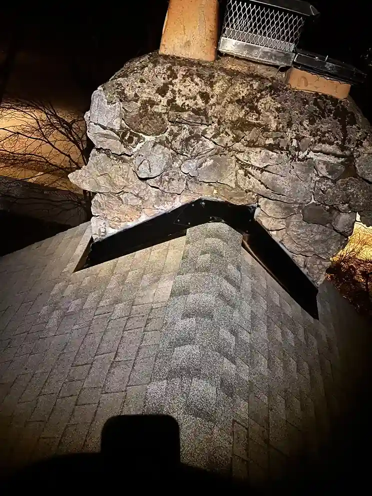 Professional stone chimney lead flashing installation detail