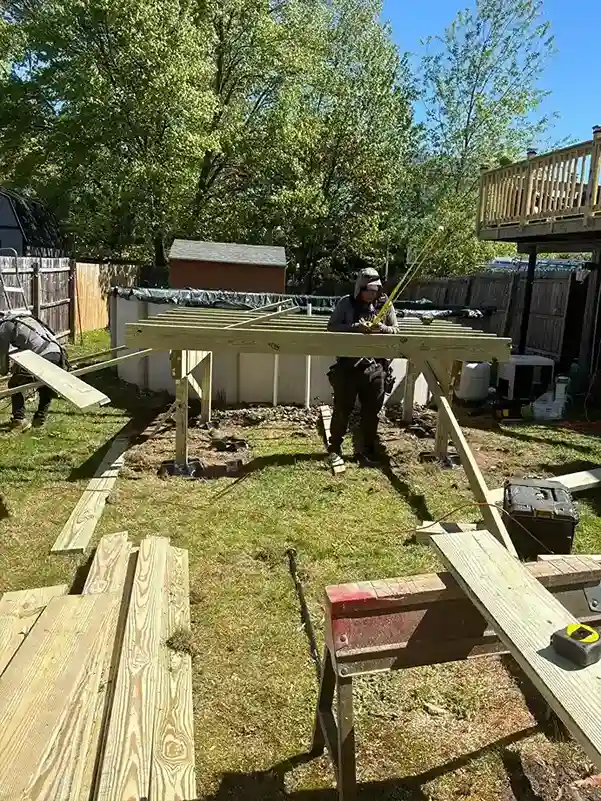 Custom curved cedar wood deck framing and board installation