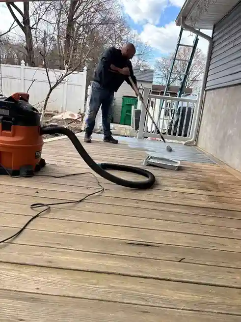 Multi-level wood deck construction with stairs connecting levels