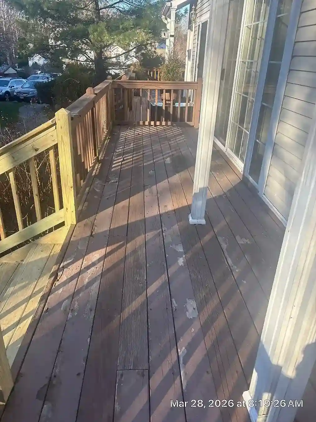 Close-up of new handrails and vertical balusters on a deck