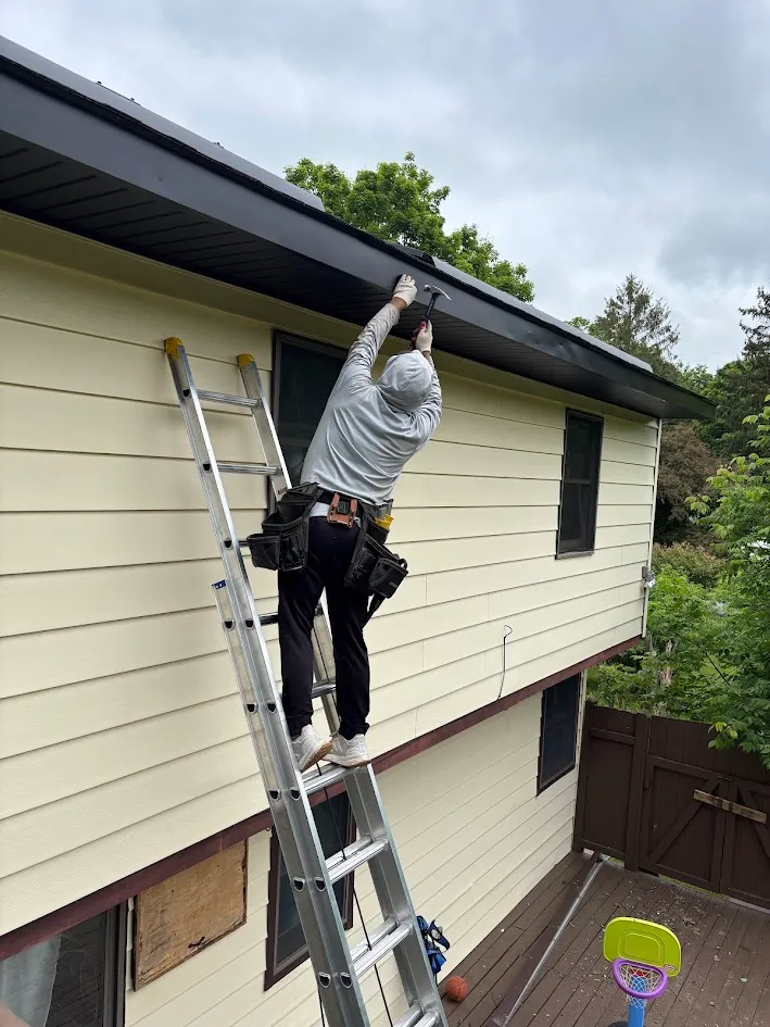 Comparison of half-round and K-style seamless gutter profiles