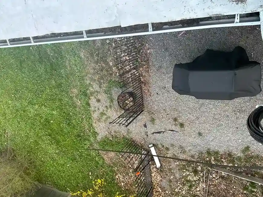 Heavy-duty commercial box gutter installation on industrial roof