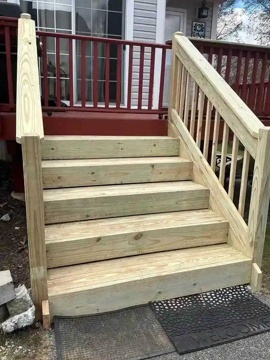 Building-code compliant railings on residential deck stairs