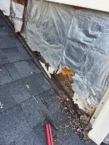 Applying protective reflective coating to a flat commercial roof