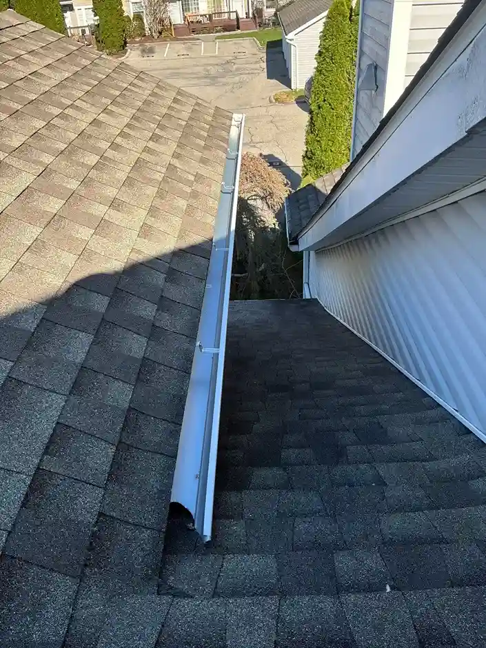 Emergency roof leak repair showing tarping and spot fixes