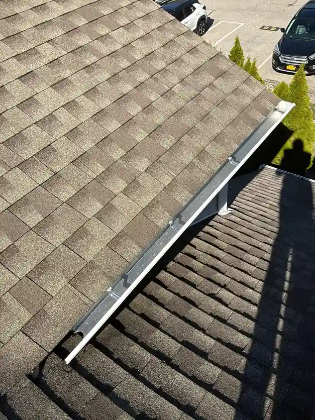 High-end slate shingle roof installation on luxury home