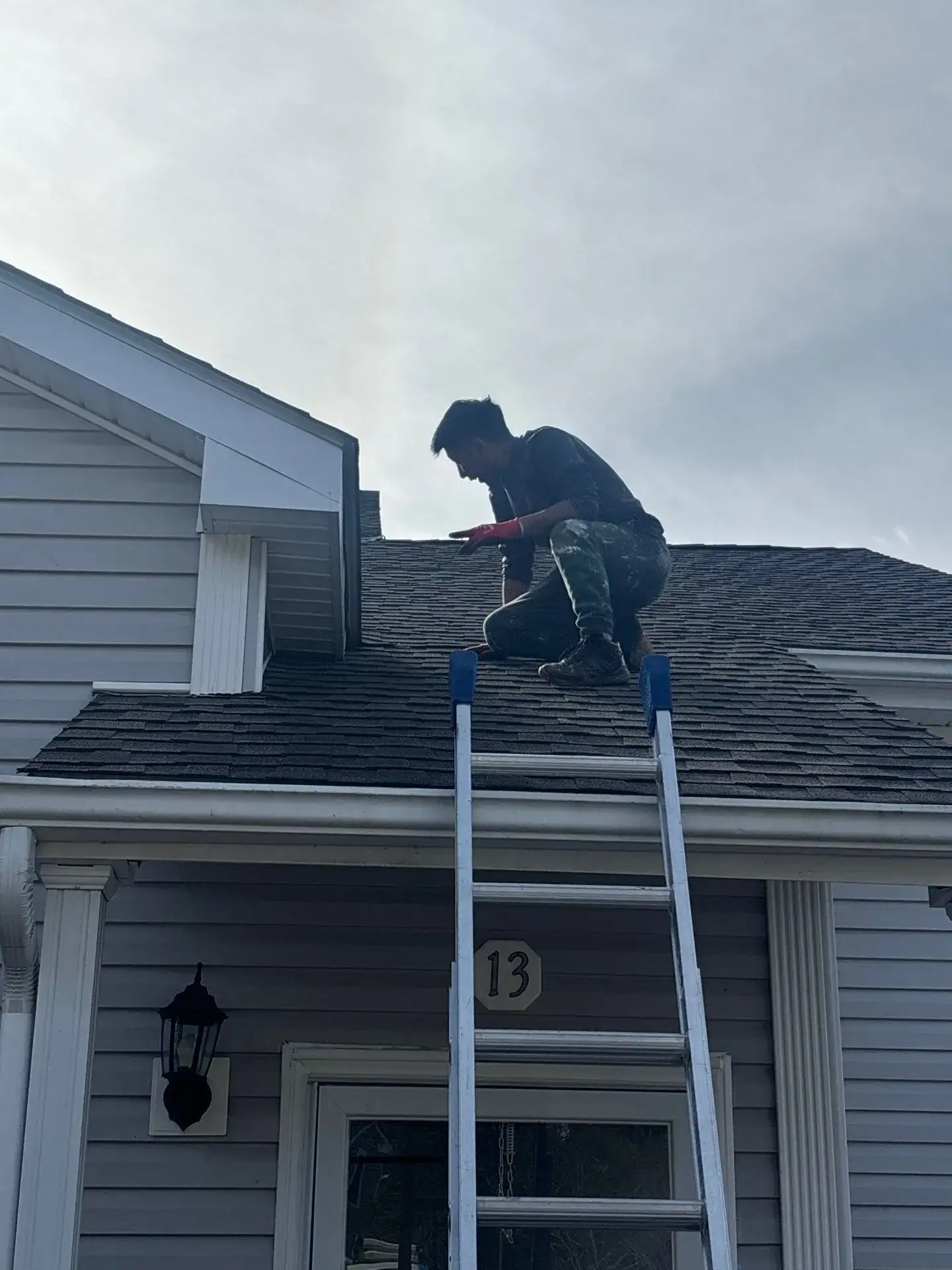 Installing sustainable eco-friendly solar roof shingles