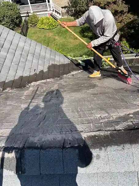 Standing seam dark grey metal roof panels installation